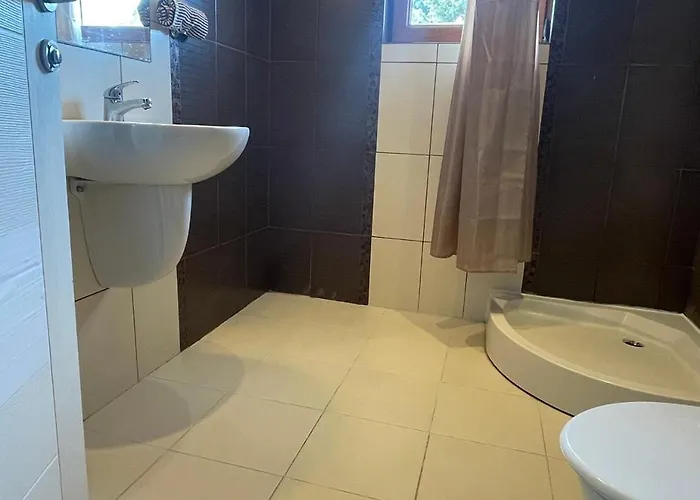 Hotel apartamentowy Rich-3 Sp Rawda